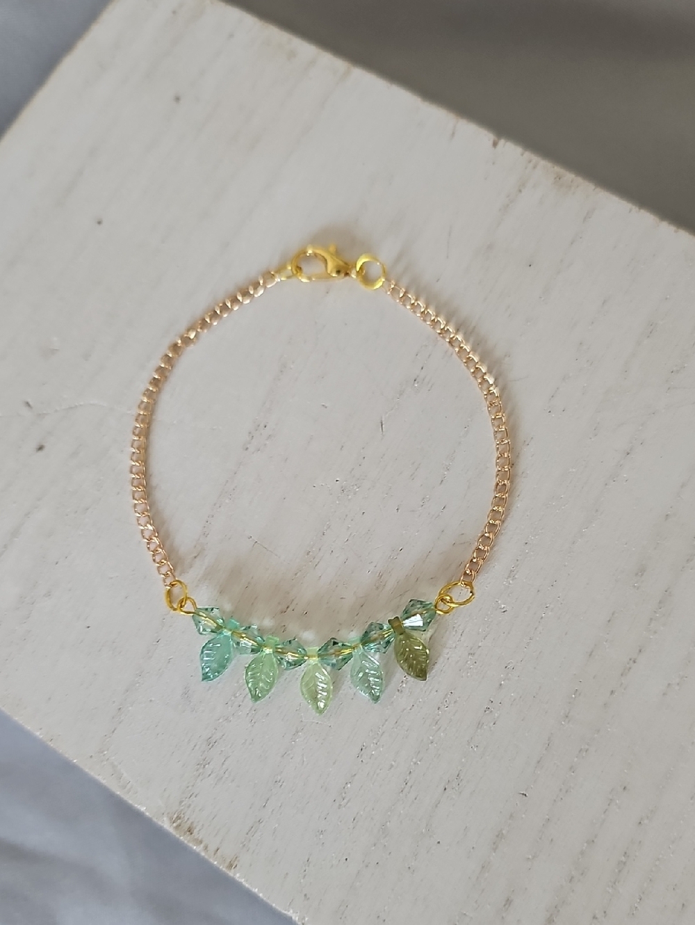 Delicate Gold Chain Bracelet with Green Leaf Charms